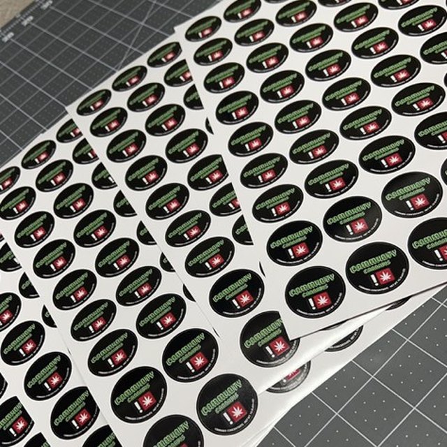Die-cut oval sticker sheet
