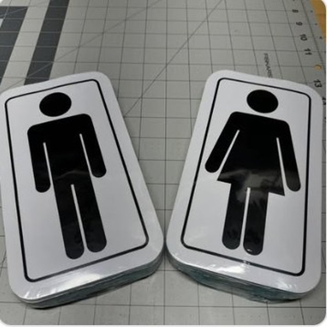 Die-cut restroom signage